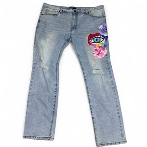Stylish Light Blue Jeans with Artistic Design